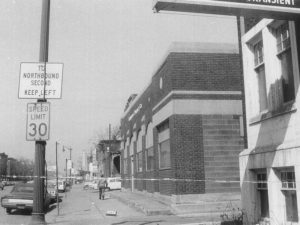 Angled black-and-white photo of the front of 4444 2nd, looking north, dating back to the 1960s.