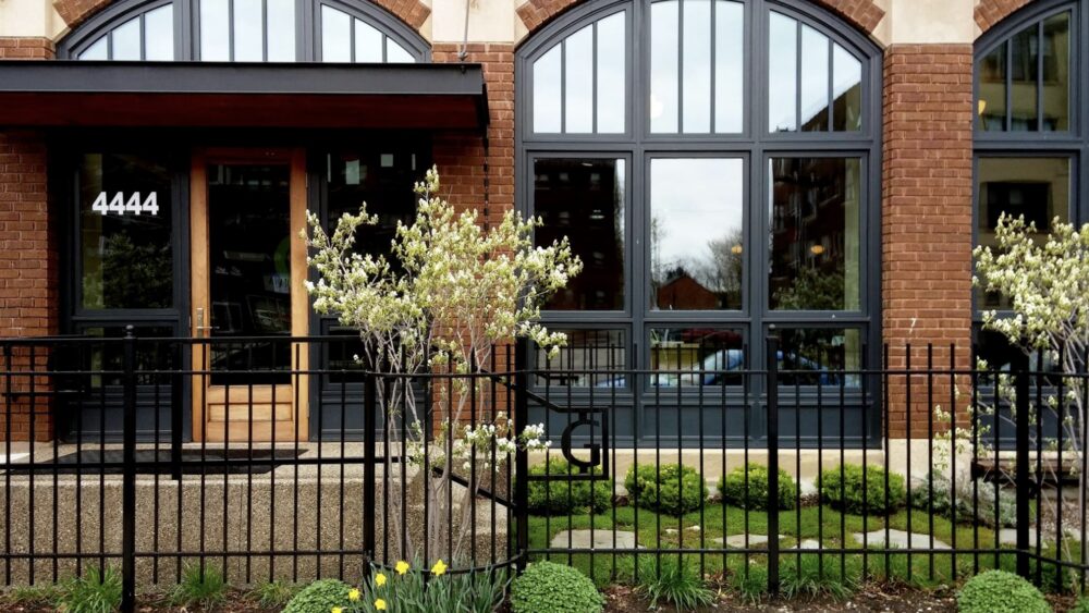 Brick and glass facade of the historic Green Garage building 